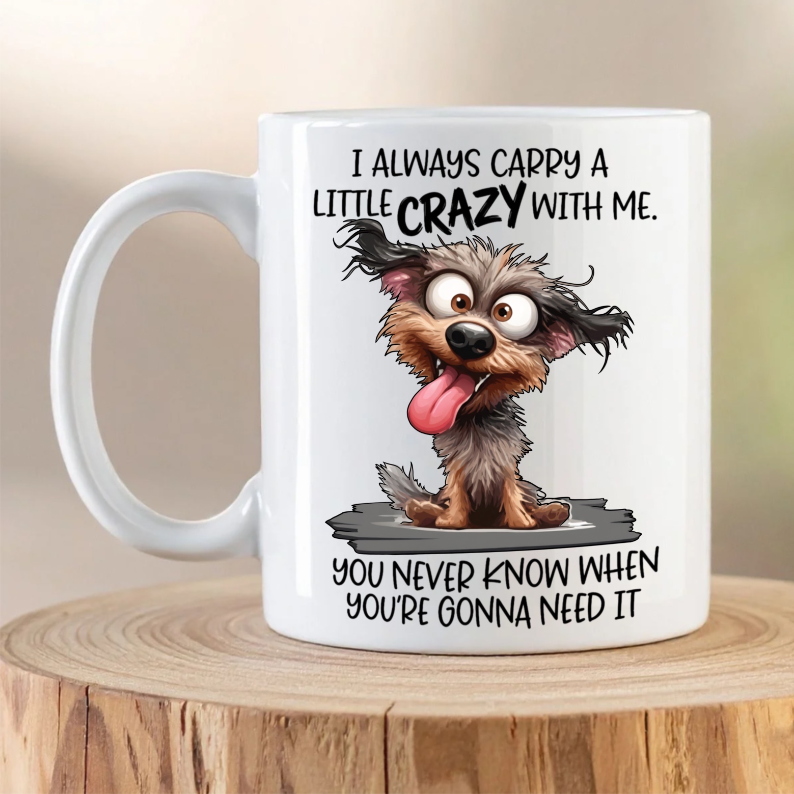 Funny ceramic coffee mug with crazy cartoon dog illustration and humorous quote about carrying a little crazy everywhere