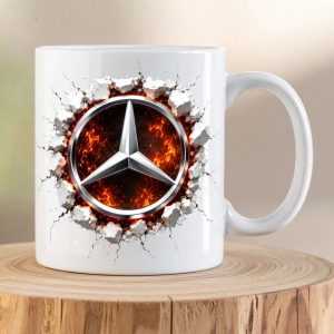 Mercedes-Benz Breaking Through Ceramic premium ceramic coffee mug featuring the iconic three-pointed star bursting through cracked white ceramic with a glowing molten background.
