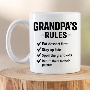 Funny Grandpa's Rules ceramic mug with humorous grandparent rules printed in bold black typography.